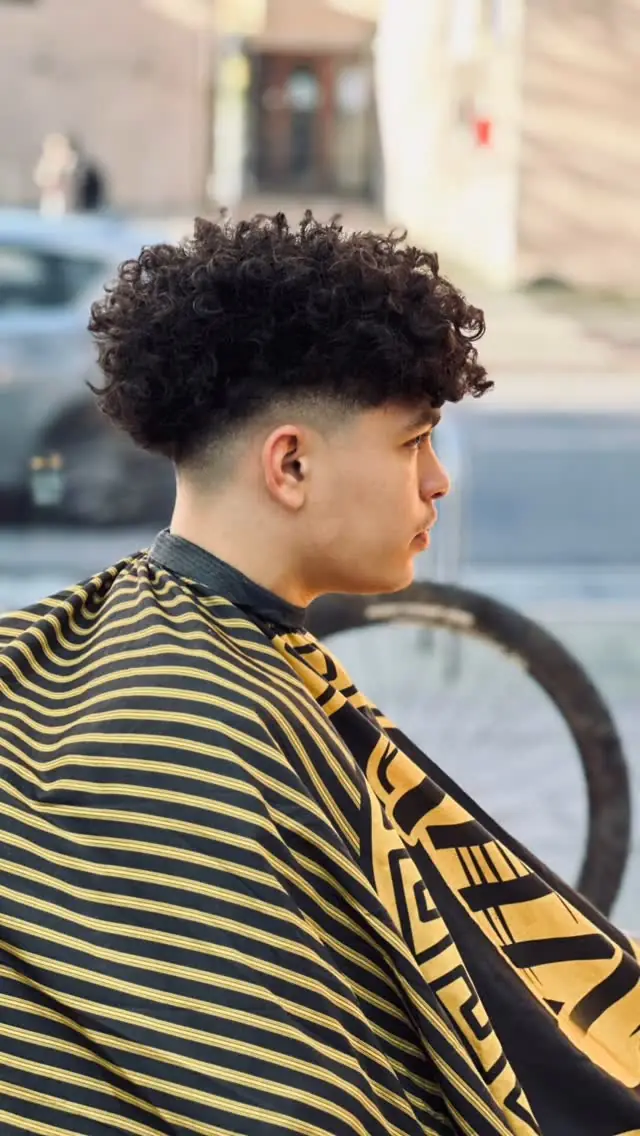 Curly top at Hulme Barbers